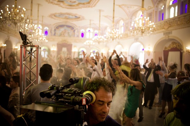 Matteo Garrone (foreground) shooting "Reality"